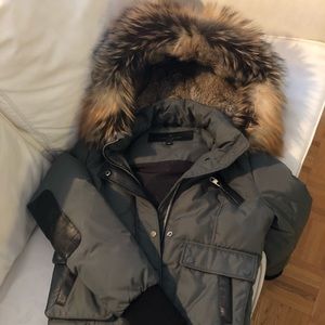 Leather and down coat Nicole Benisti.